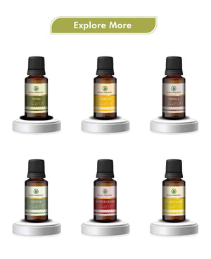 Tea tree oil bottle with fresh green leaves