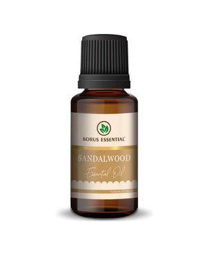 korus essential sandalwood oil bottle with therapeutic grade label