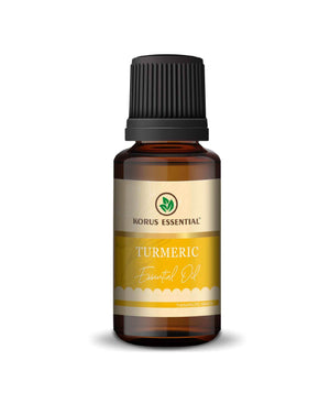 Korus Essential Turmeric Oil bottle with natural turmeric roots